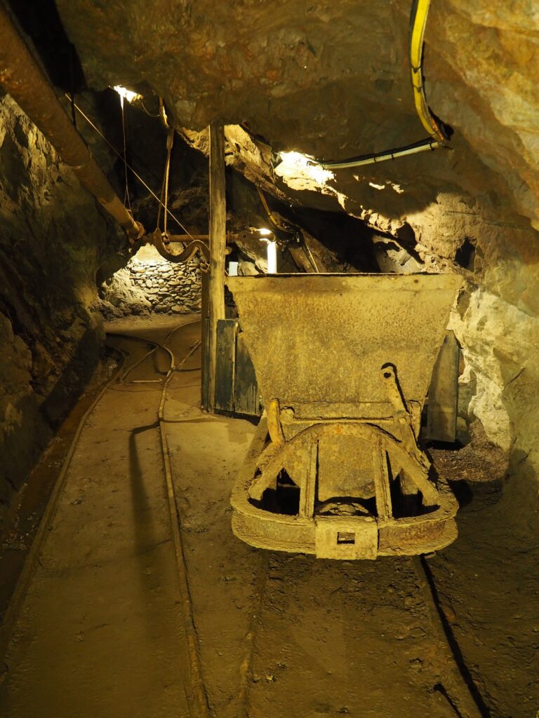 Mining car on tracks in a mine