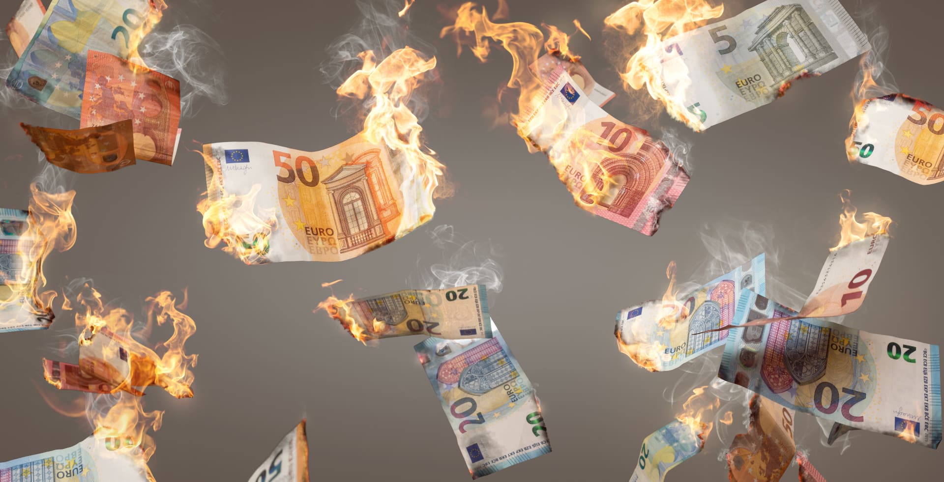 Various burning euro notes fall down
